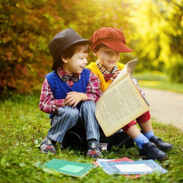 A child reading a book in a cozy setting, symbolizing the joy of reading on International Children's Book Day 2025.